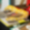 Monte the Burmese python with ASDAN Books.PNG