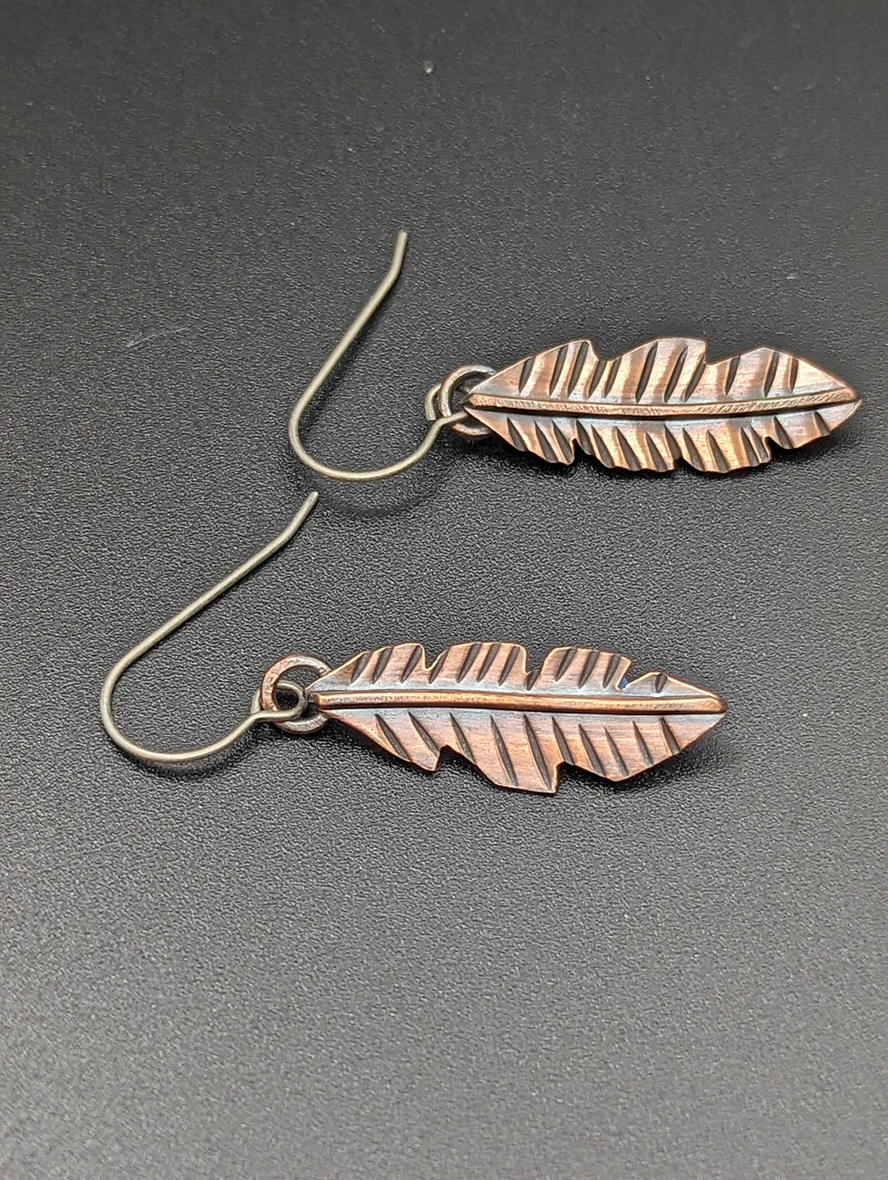 Thumbnail: Copper feathers: long