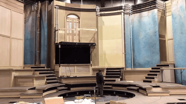 Hudson Scenic Studios' automation designers and fabricators test the automated splitting of walls for the Broadway set of Hadestown.