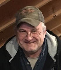 Jayson in garage.jpg