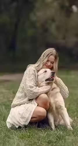 woman-brown-sweater-lady-with-labrador_1157-42403.avif
