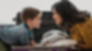 medium-shot-smiley-woman-looking-kid_23-2148813252.jpg