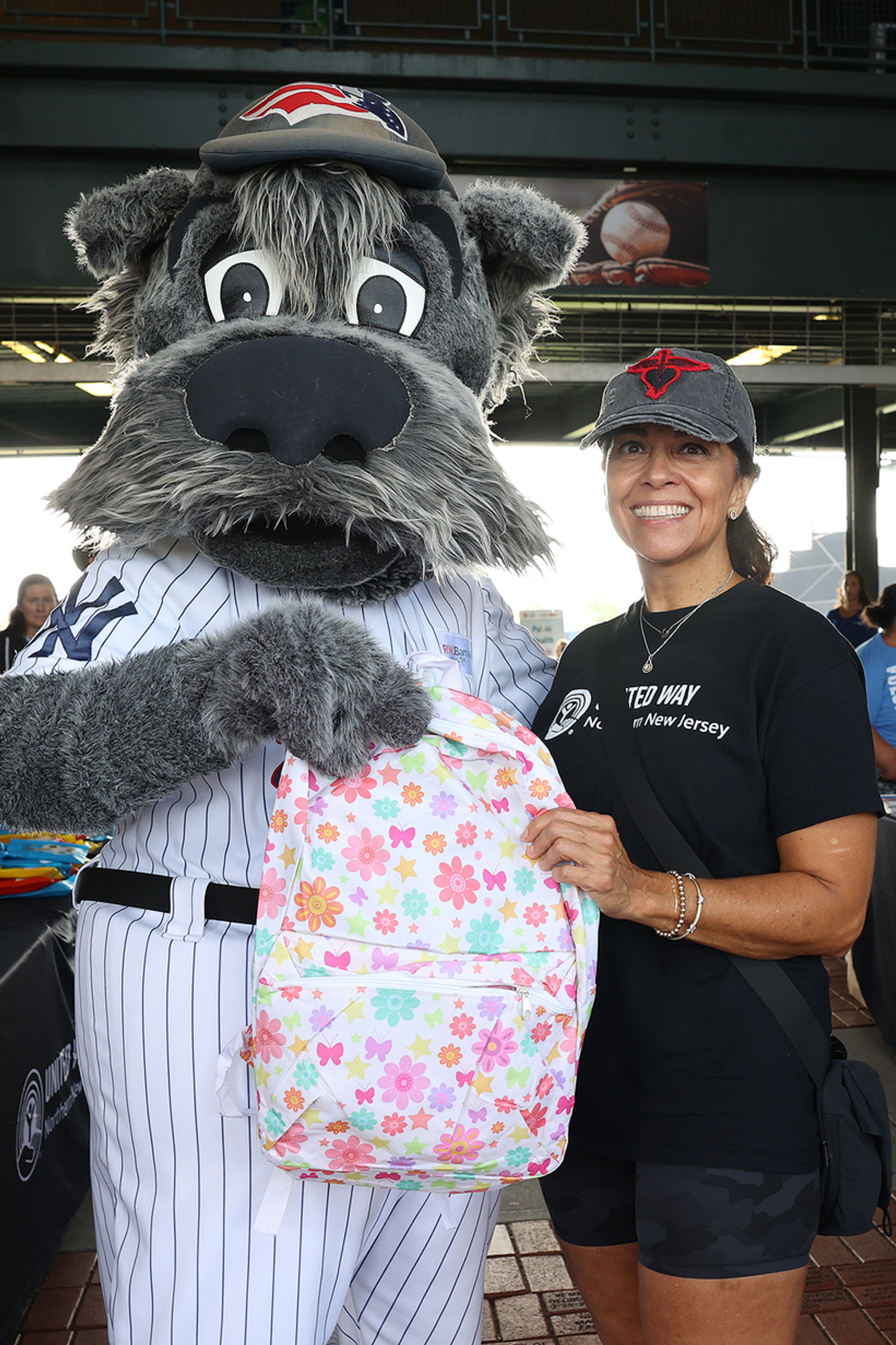 Somerset Patriots' Sparky & CEO of United Way Northern New Jersey Kiran Handa Gaudioso