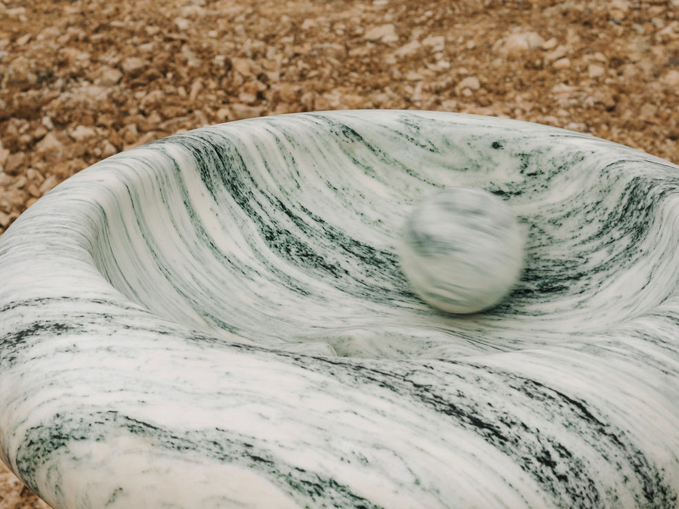 Roll ball sink made entirely of marble for bathroom design