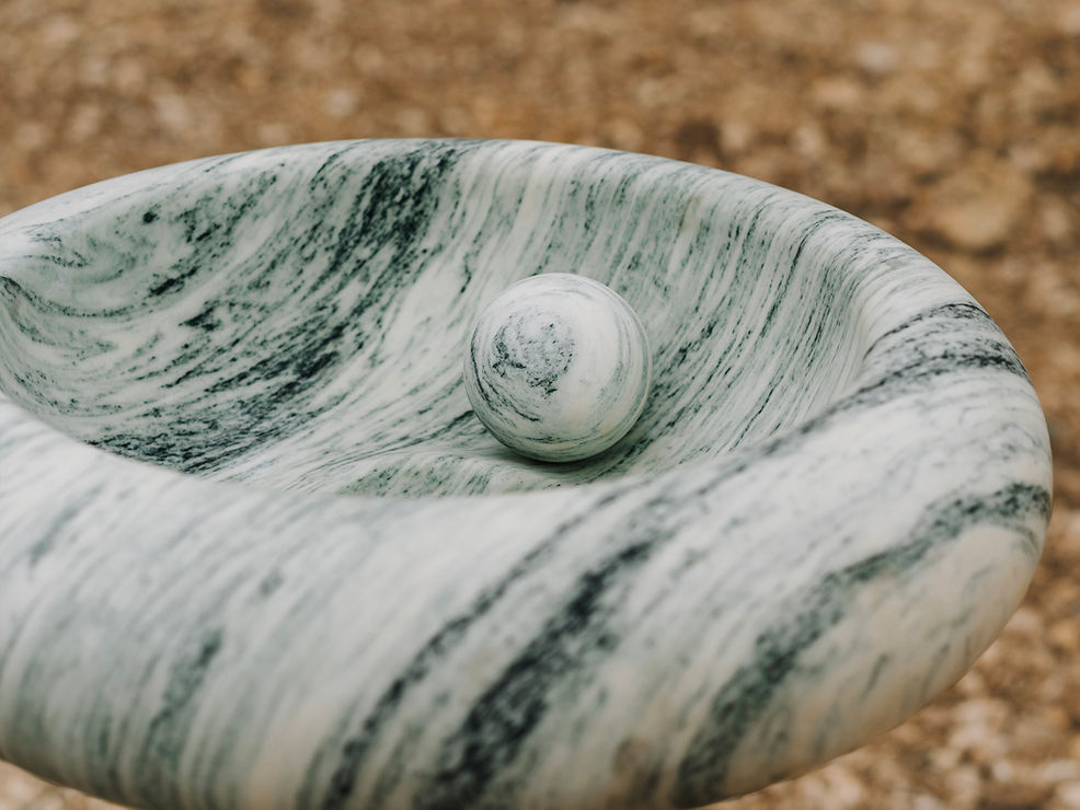 Roll ball sink made entirely of marble for bathroom design