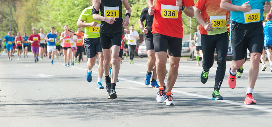 Marathon, street runners in spring day.
