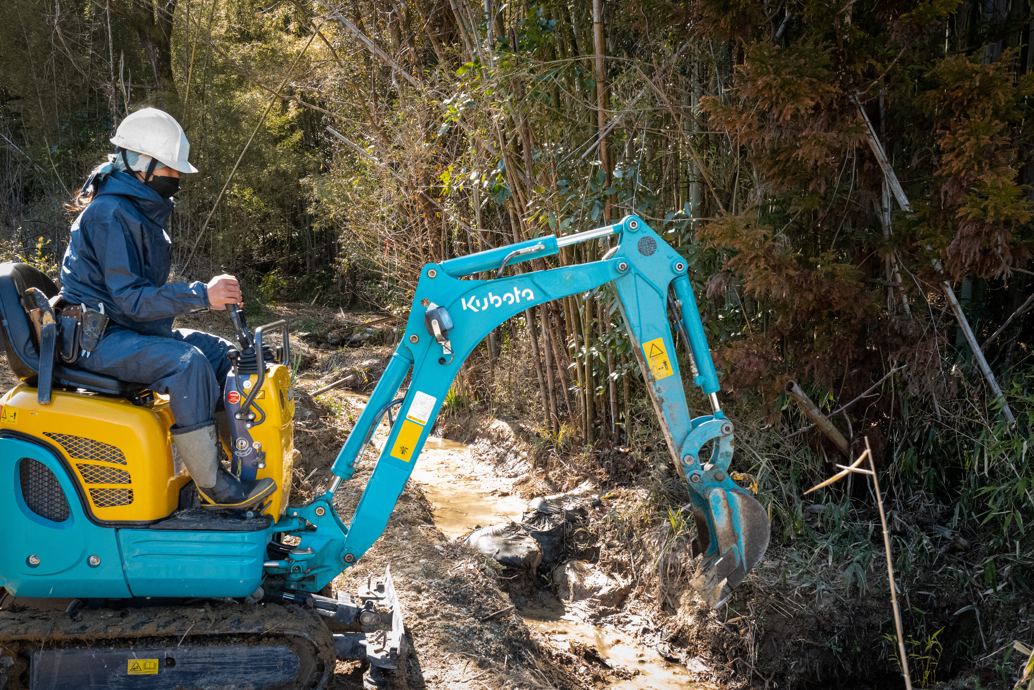 Restoration of stream channel damaged by runoff and sand and mud
