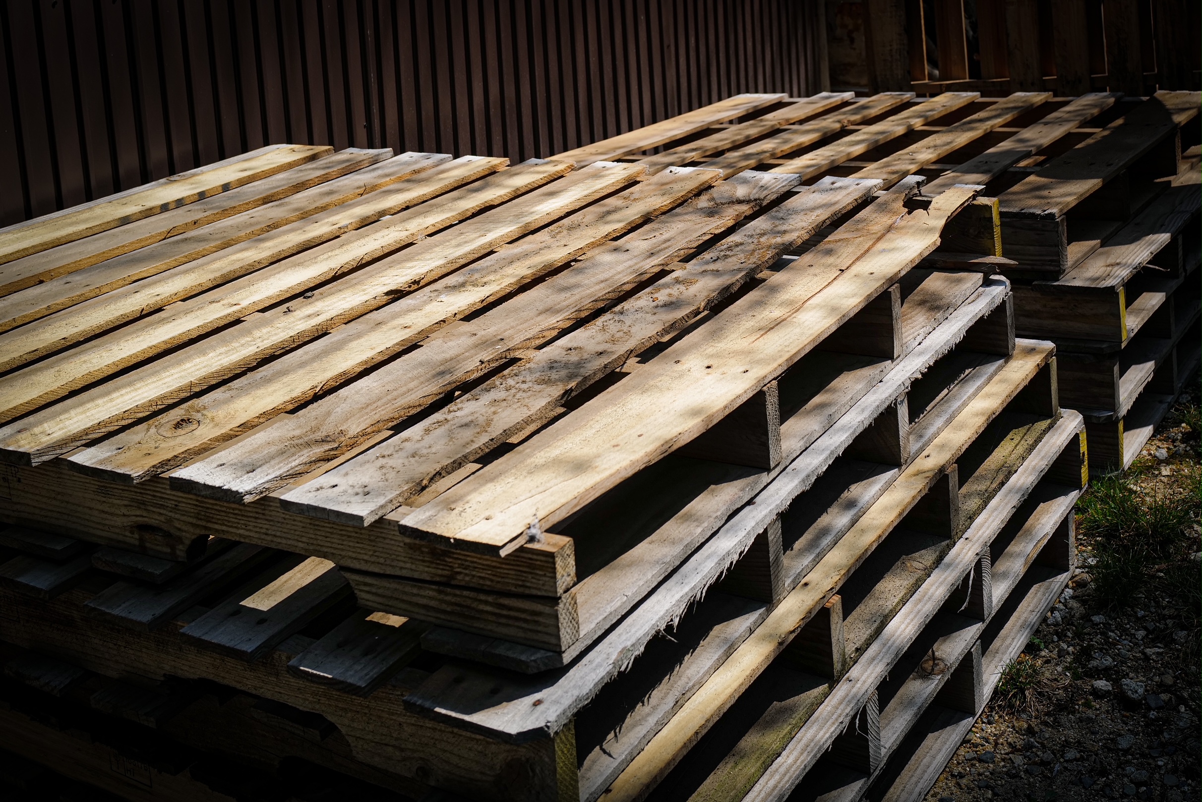 Reused wooden pallets - look around and you'll see HAPPY eco-stacks.