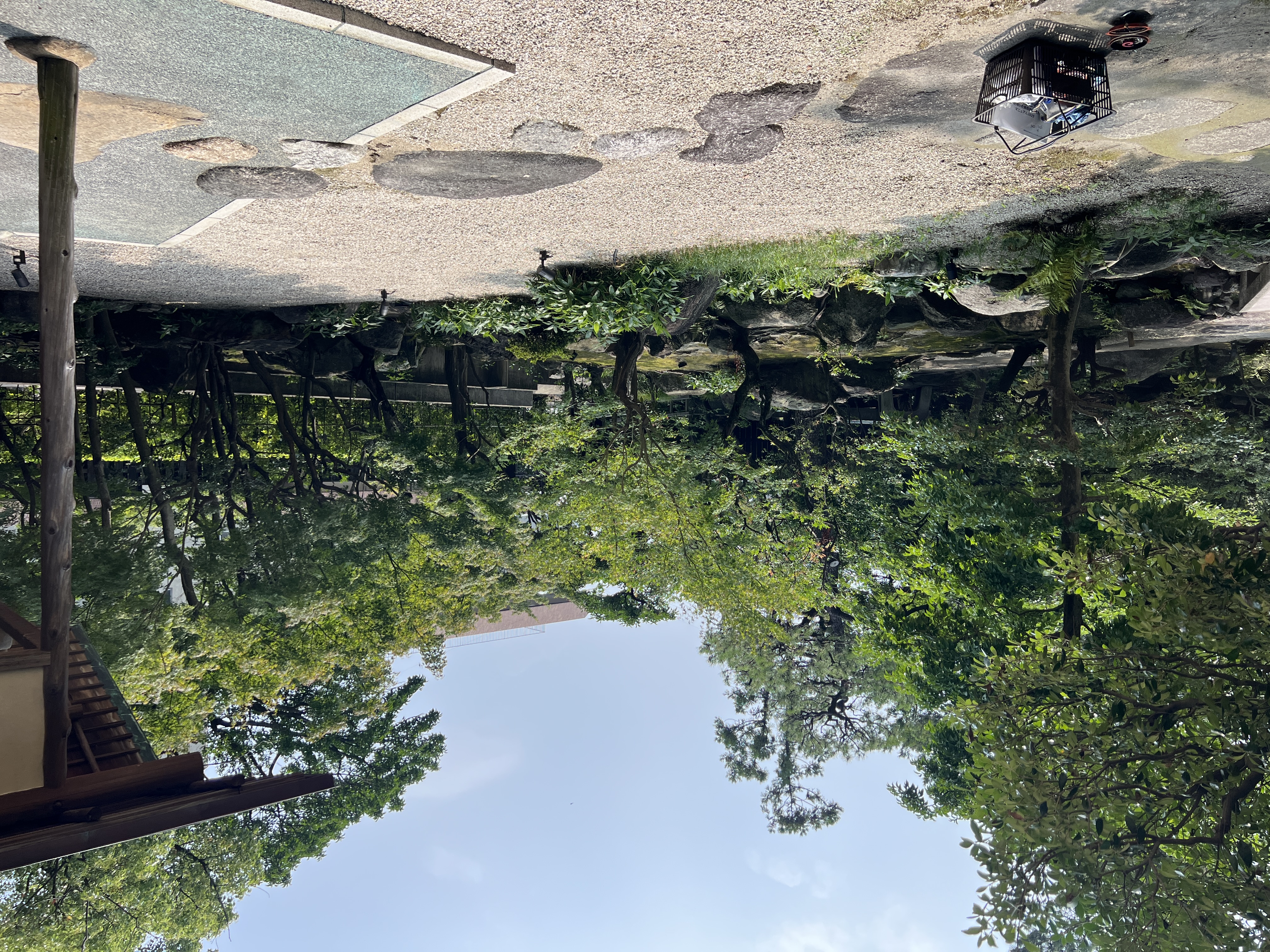 Wide view of the traditional Japanese garden at Yokkaichi Harbor Onoe Villa, maintained by Sentei-ya Sora