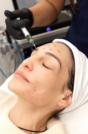 woman gets a facial with obagi products 