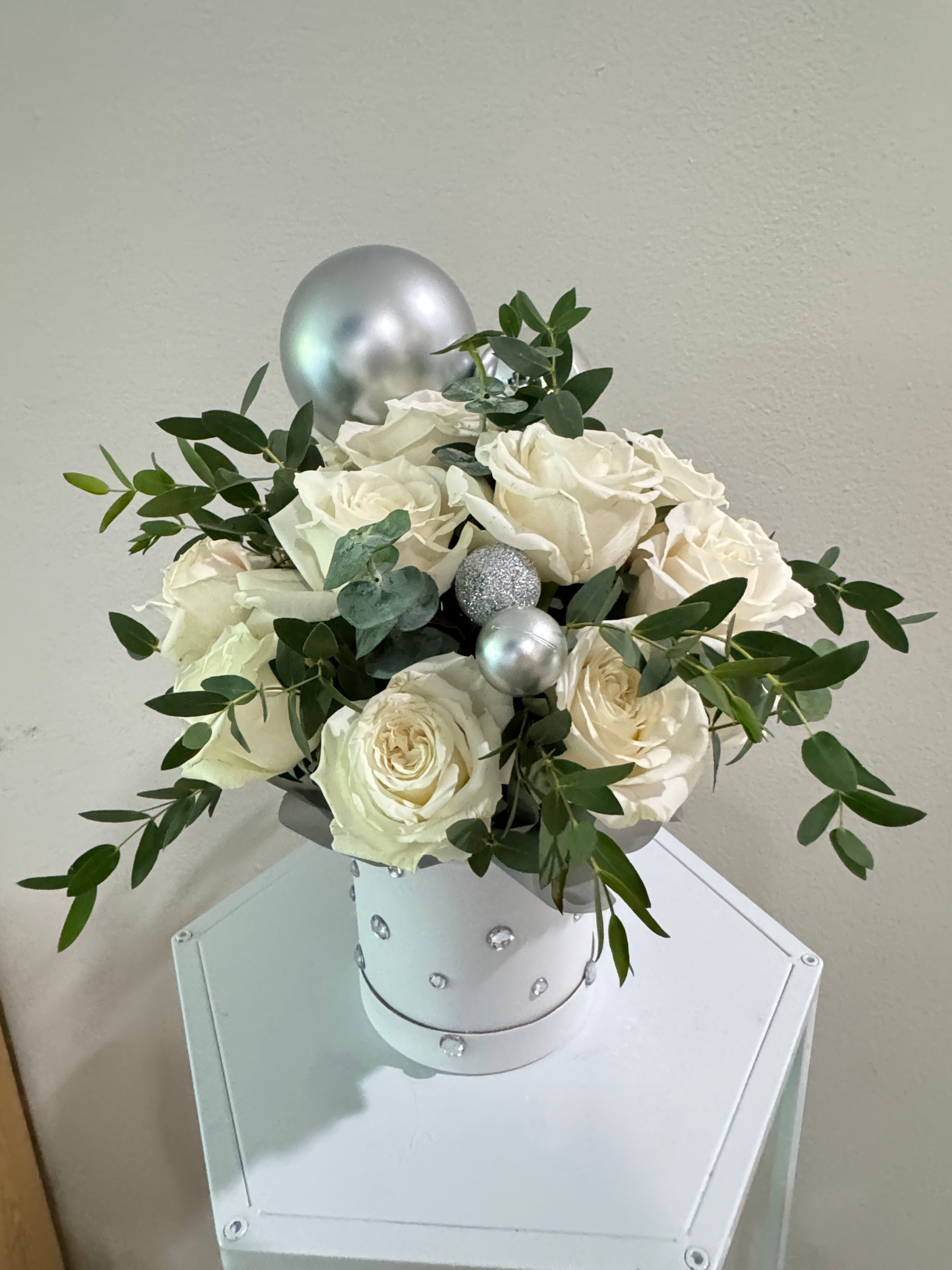 Small Flower Centerpiece with a Dozen and a Half Roses in Silver