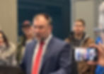Artur Pawlowski giving a press conference insid