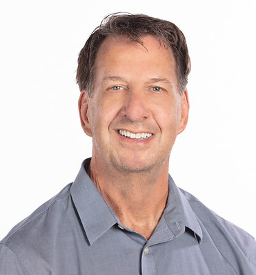 Photo of author Peter Buckley smiling