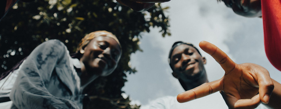 Group of Youth Doing Peace Sign.png