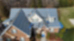 Team working on the roof by Highlands Roofing