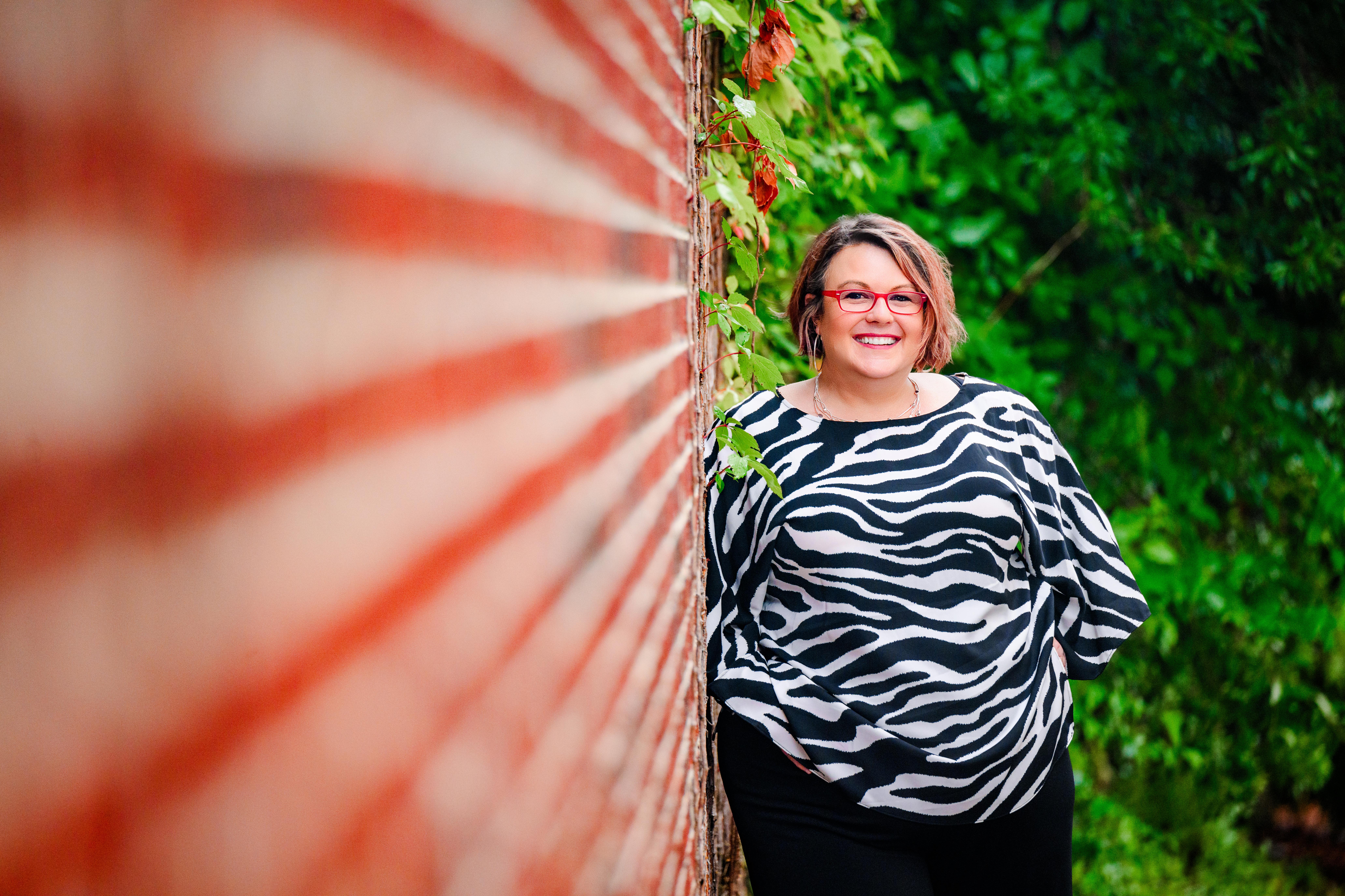 Melissa Overton smiling, professional speaker and nurse trainer