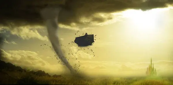 A Wizard of Oz inspired scene with a tornado and Emerald city in the background