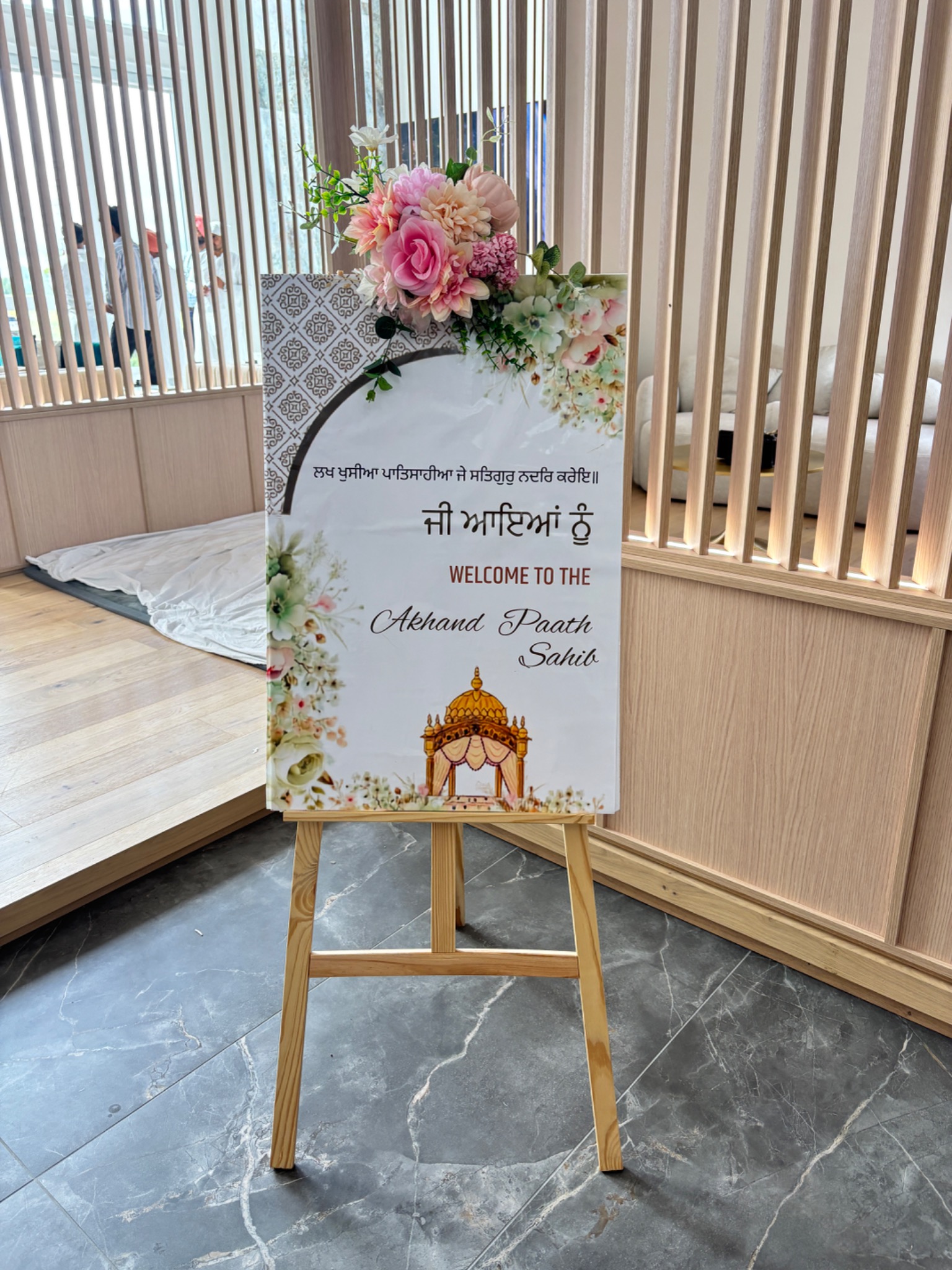 Personalized welcome sign with romantic floral styling