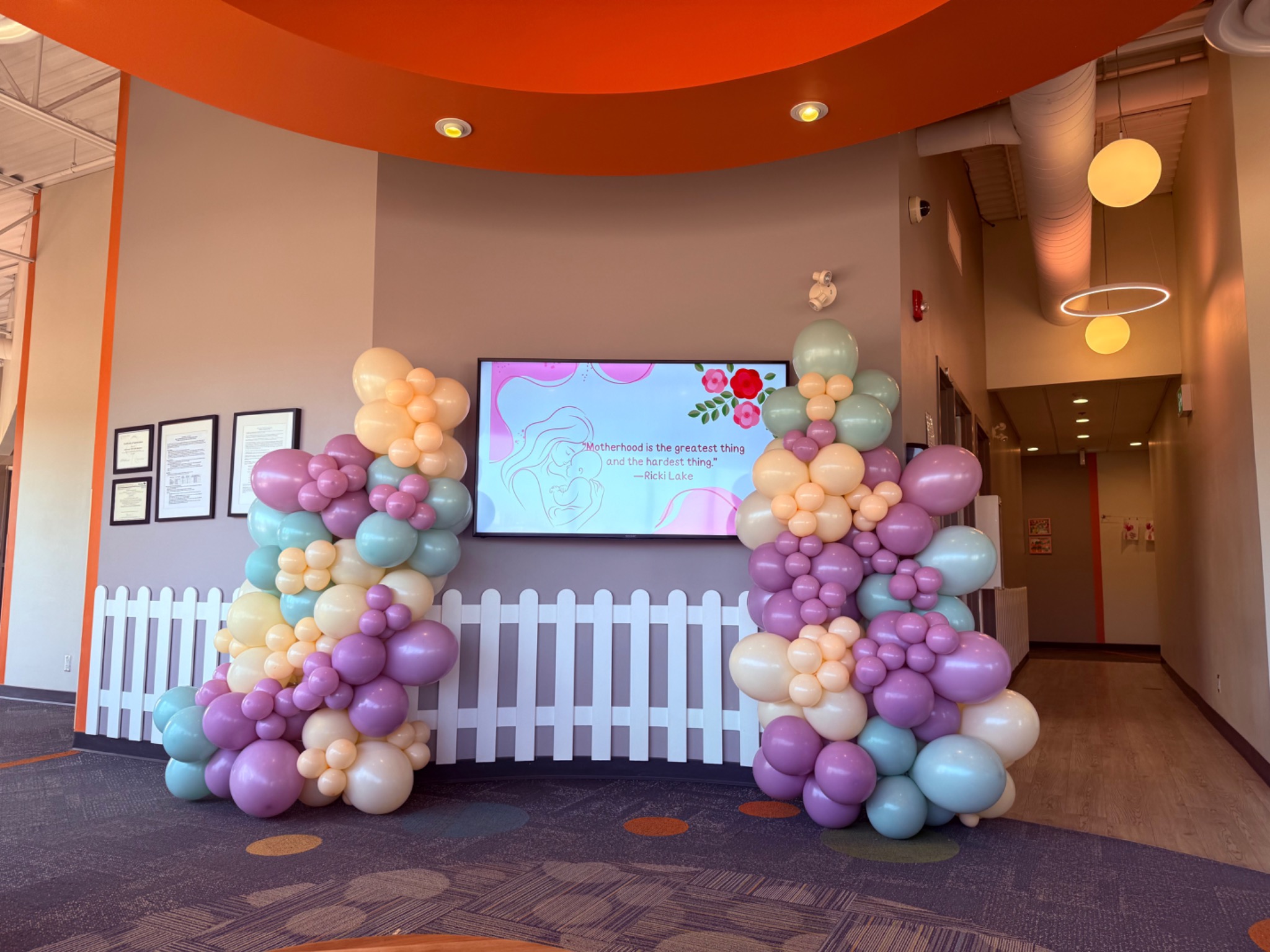 Pastel balloon installation for a family celebration
