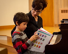 Seattle piano instructor Stephanie Emery teaching a piano lesson