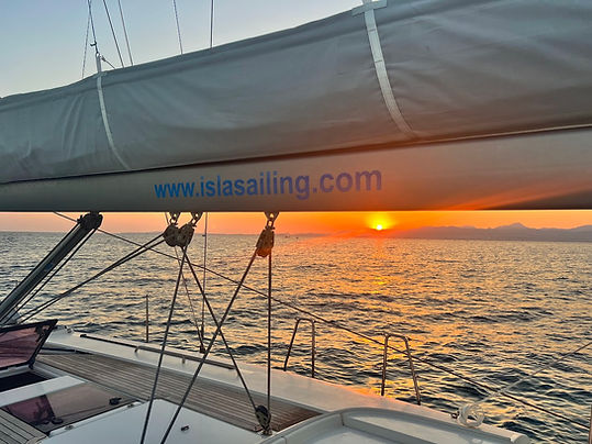 Mallorca sunset viewed from the sea, Isla Sailing