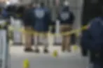 Detectives investigating the crime scene in Manhattan