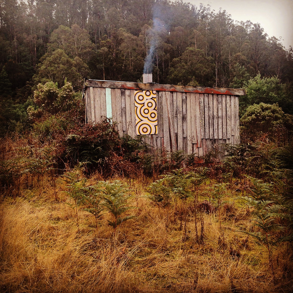 Wooden shack with rgbDesigner painting.