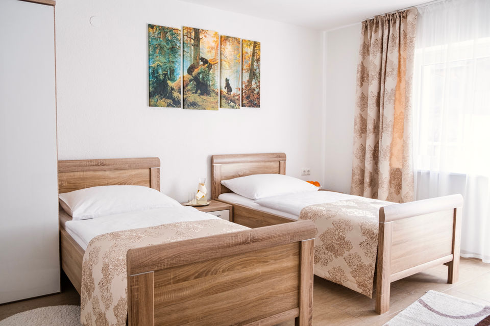 Schlafraum Bett Bedroom Apartments Davydov Ferienwohnung Appartement Bad Hofgastein Gastein Salzburg