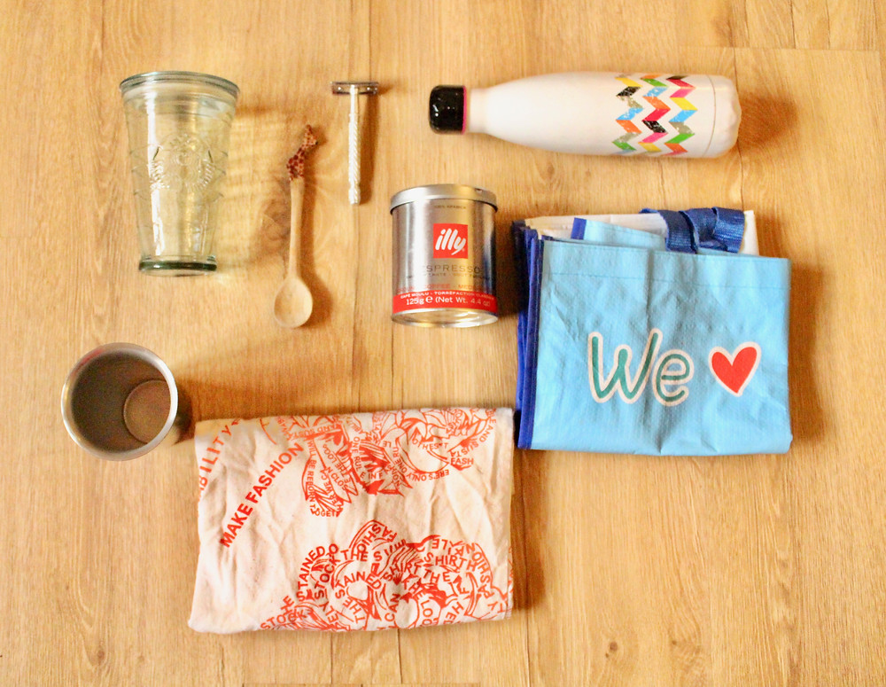 aluminum bottle, canvas bag, metal razor, recycled bag, glass bottle