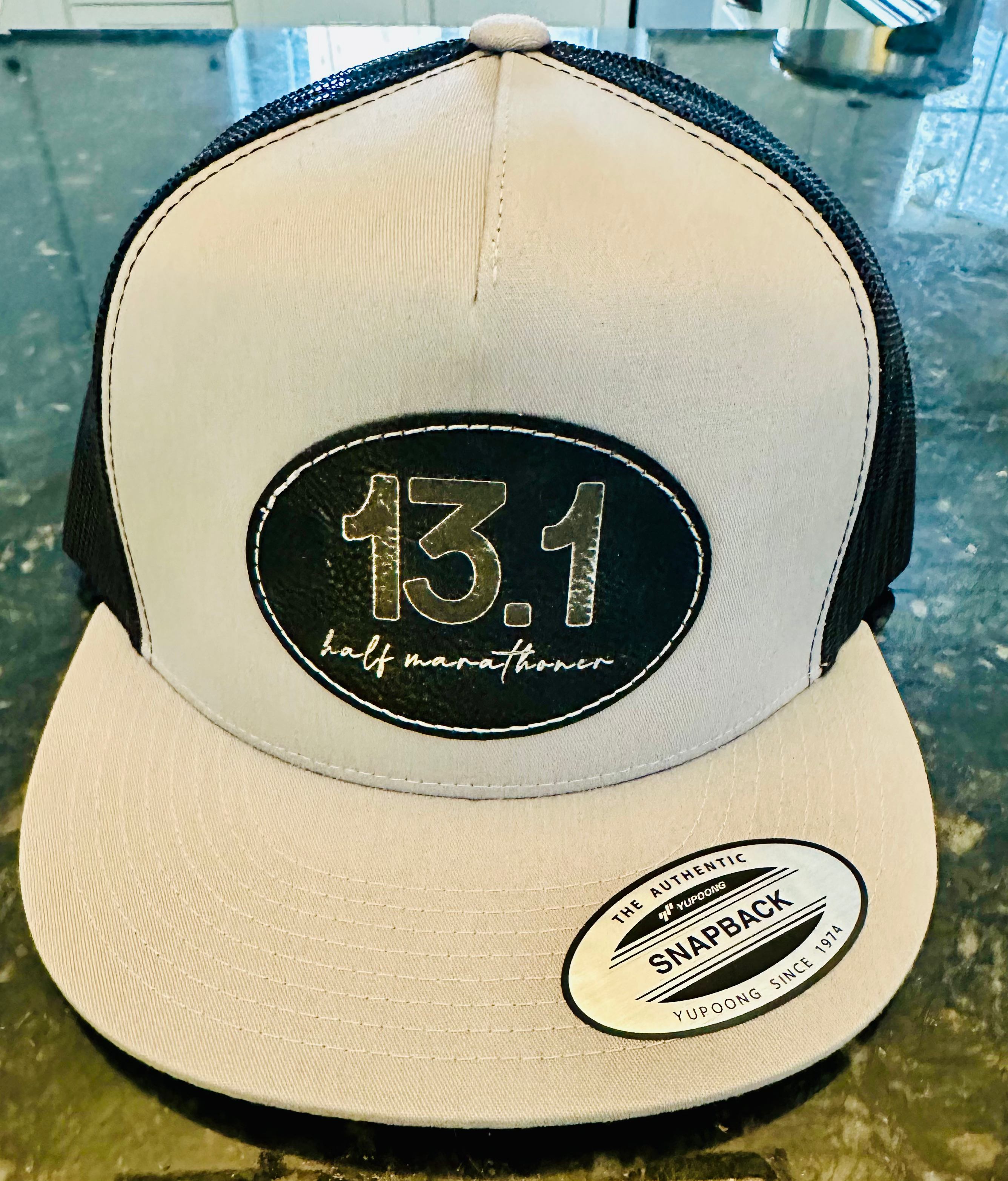 custom baseball hats. send in your design or have naught too shabby create a design for you. leatherette patches with a variety of colors, sizes and shapes.