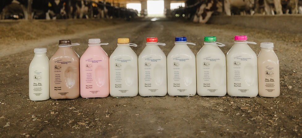 Assorted Burbach’s Countryside Dairy glass-bottled milk flavors with “Find Our Milk Near You” text