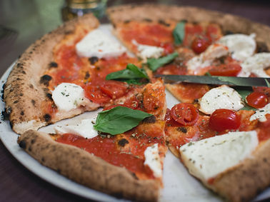 Pizza con pomodori