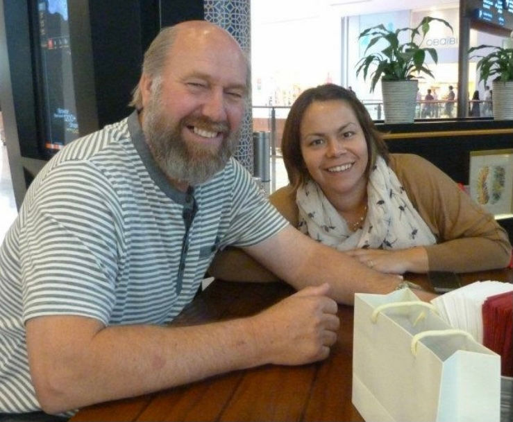 Loretta Davie and her dad sat at a table smiling