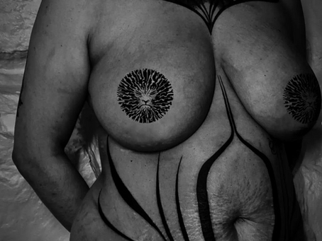 black work tattoos on a body