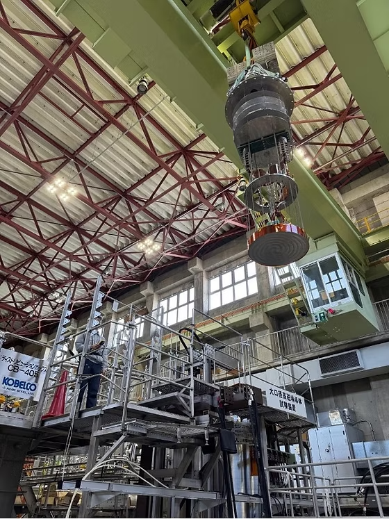 A test high-temperature superconducting (HTS) coil being hoisted for installation into NIFS’s globally rare Large-Diameter High-Field Conductor Test Facility(Photographed in 2025 at the National Institute for Fusion Science, Toki, Gifu, Japan)