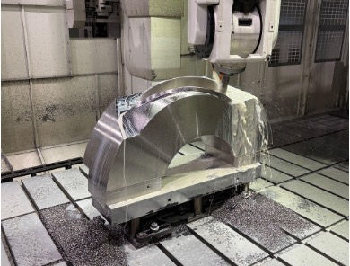 Machining of a prototype coil case. A high-hardness material is carefully milled using a five-axis machining center.