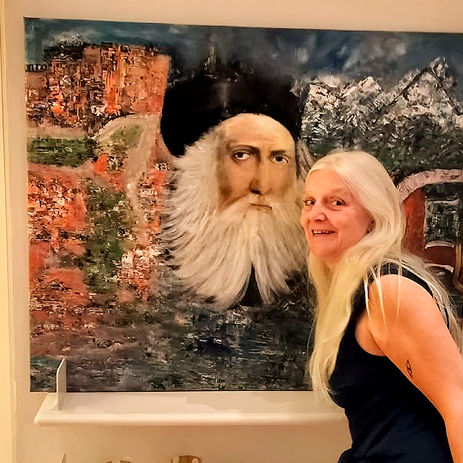 Pia admiring the Leonardo da Vinci painting during the 'Below The Sun Line' exhibition opening, with musician Byrn Jones performing in the background.