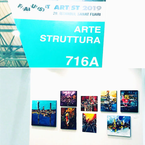 Exhibition signage and curated miniature abstract wall layout at a major international art fair.