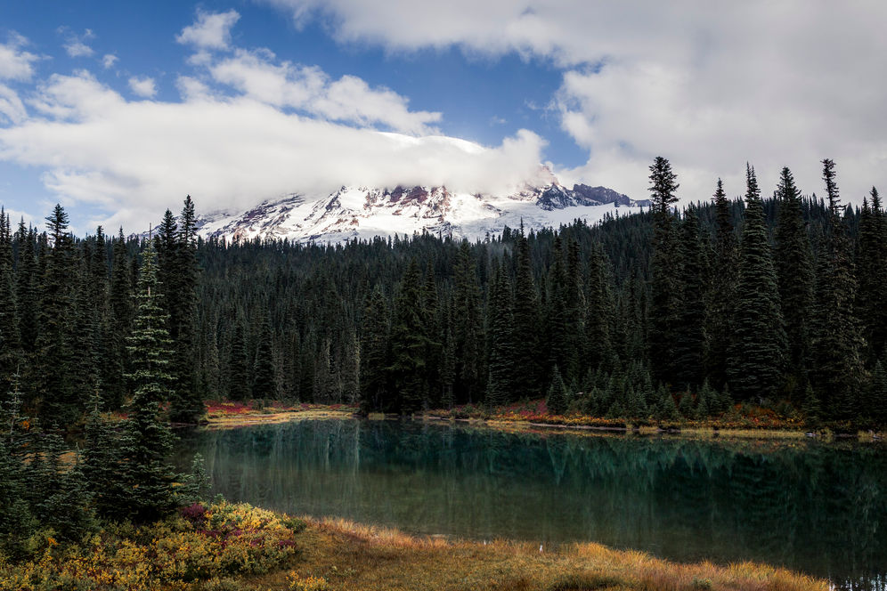Mountain lake beneath a snow covered peak in Washington