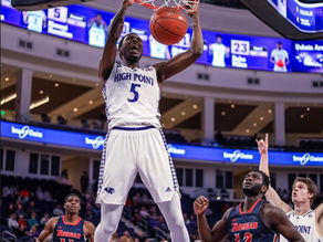 Juslin Bodo Bodo dunking the ball at an HPU home game.