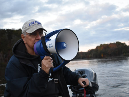 Coach Whicker coaching the HPU rowing team.