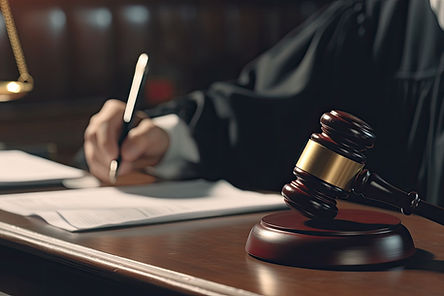 Judge in court room writing report judge hammer