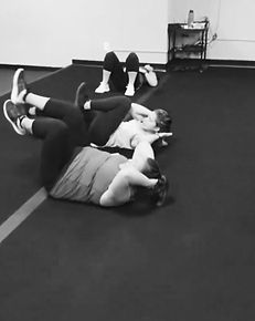 Greenville SC personal trainer and clients exercise together in small group fitness class at Gray Training