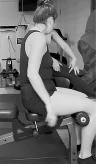 Gray Training : Corrective Exercise Specialist explaining how to target quadriceps heads - Personal training in Greenville SC