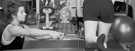 NASM certified personal trainer cues vastus lateralis and glute medius engagement during banded bulgarian split squats - Greenville SC personal training at Gray Training