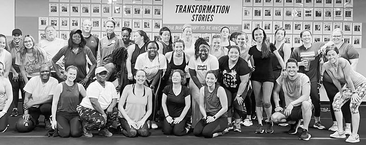 Personal trainer in Greenville SC leading a large group fitness class Gray Training personal training studio