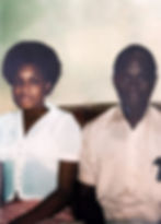 The restored photo of a father and daughter with color correction.