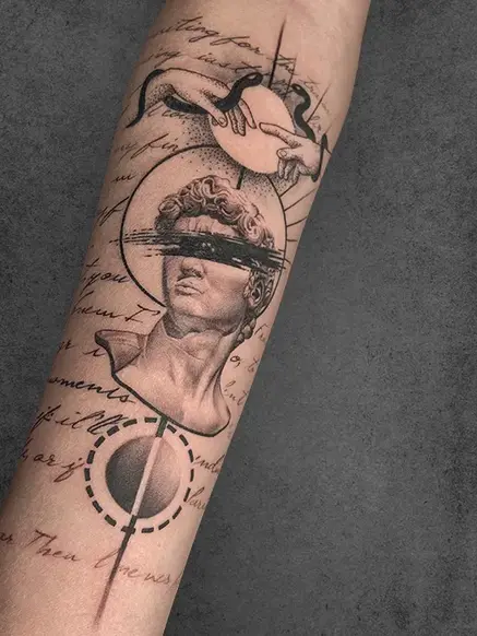 roman statue and script tattoo
