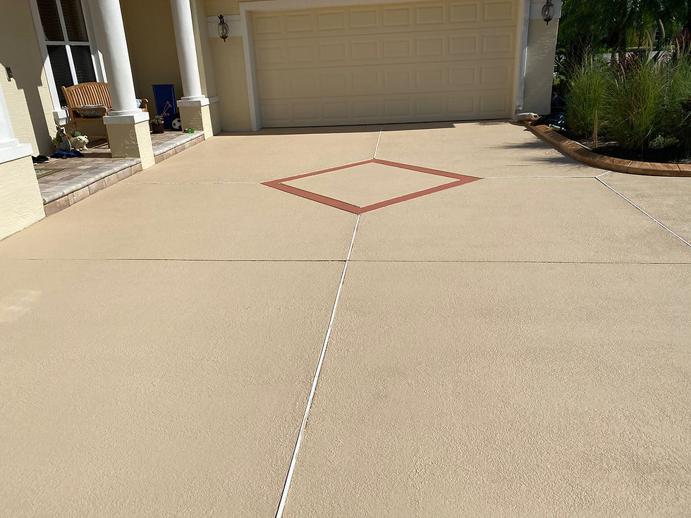 Tan concrete driveway with decorative diamond pattern