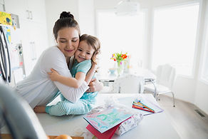 Mother Hugging Child
